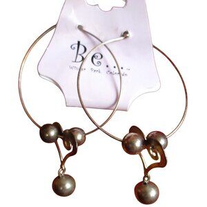 Silver Hoop Earrings With Dangle Ball Accent By Be. From Winter Park CO